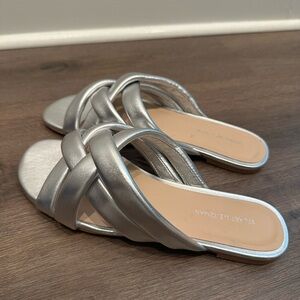 STUART WEITZMAN CROSSOVER LEATHER SLIDE in silver 8.5